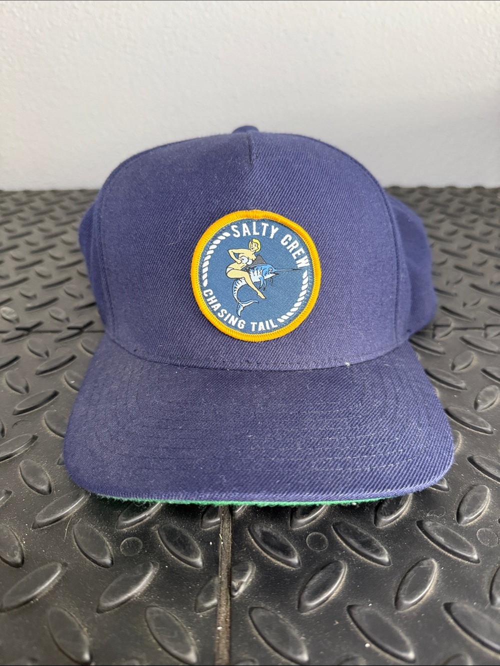 Salty Crew Navy Cap with Yellow-Trim Chasing Tail Patch